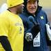 Former Michigan football player Lasker Smith chats with announcer Frank Beckmann during the annual alumni flag football game before spring practice at Michigan Stadium on Saturday, April 13, 2013. Melanie Maxwell I AnnArbor.com